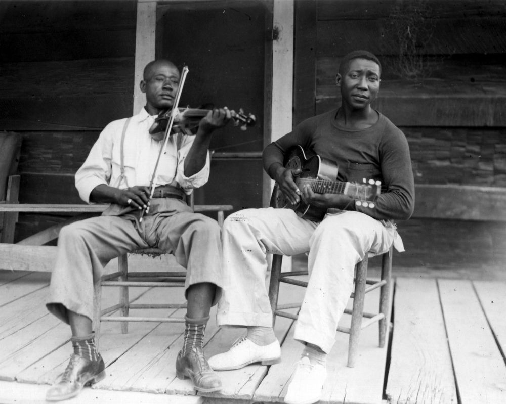 Henry Son Sims and Muddy Waters at Stovall Plantation