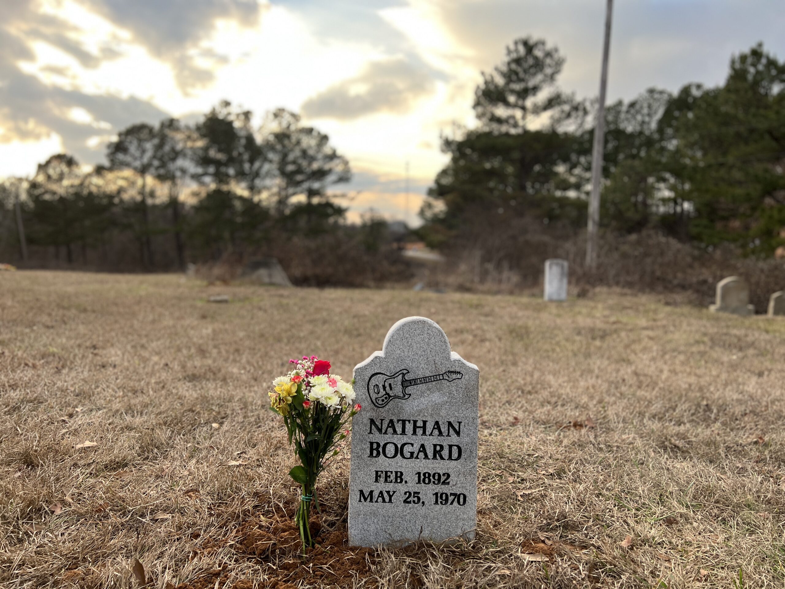 The headstone of Nathan Beauregard at Shiloh MB Church in Ashland, MS. The line drawing for the Kingston Swinga guitar was done by Gary Tennant, and master engraver, Alan Orlicek, fabricated the marker.