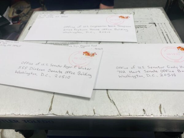 Envelopes containing the letters that we sent to our elected representatives in Mississippi